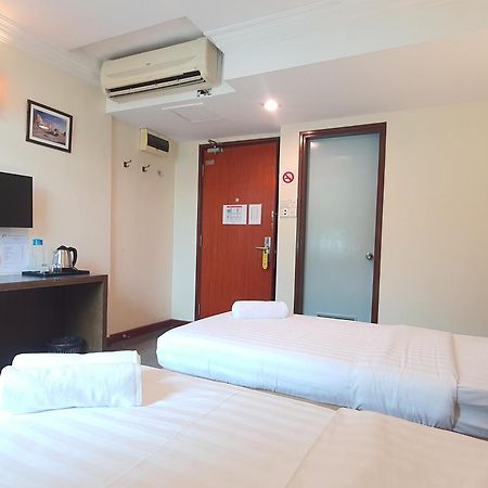 Capital O 90939 Sandakan Central Hotel ภายนอก รูปภาพ