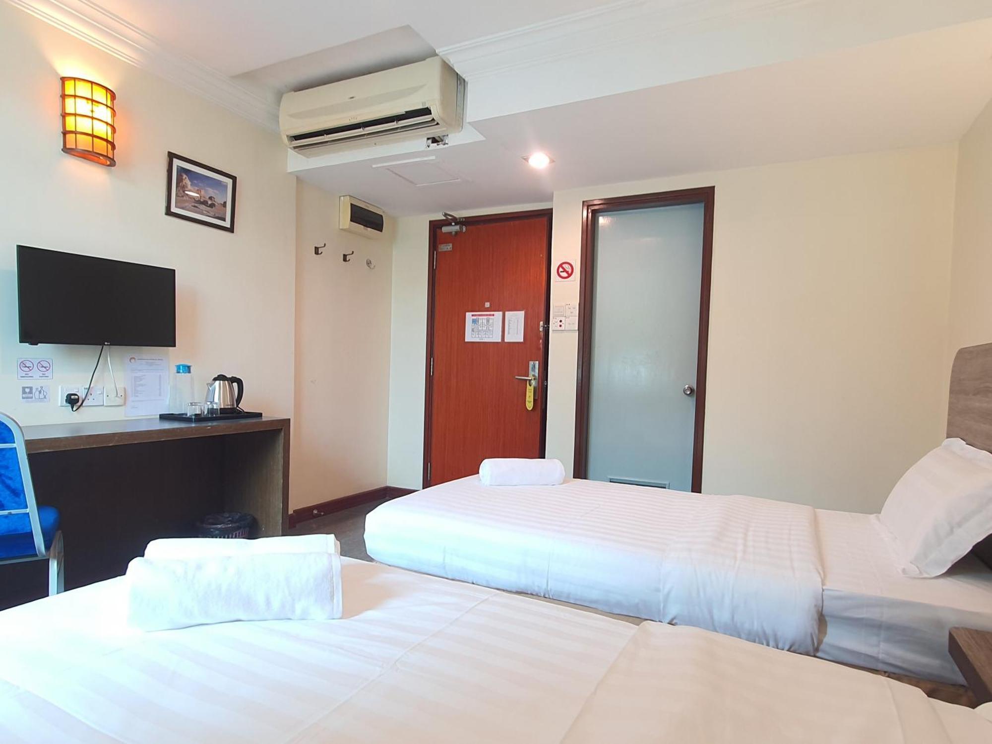 Capital O 90939 Sandakan Central Hotel ภายนอก รูปภาพ